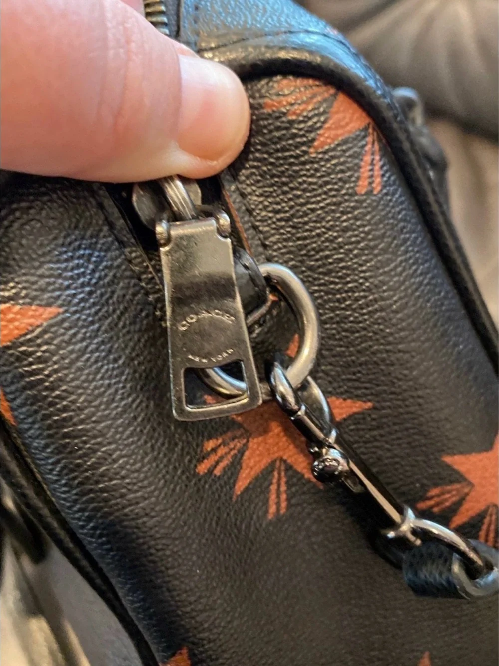 Coach Black Leather Satchel with Rust Star Print